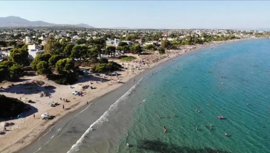 Artemida (Artemis) beach near Rafina — a long sandy, shallow bay